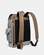 COACH®,RIVINGTON BACKPACK IN COLORBLOCK WITH COACH PATCH,n/a,Large,Black Copper/Washed Steel,Angle View