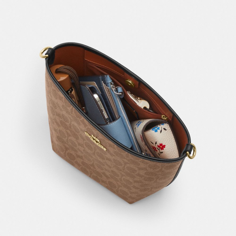COACH®,City Bucket Bag In Signature Canvas With Star Charm,,Collection