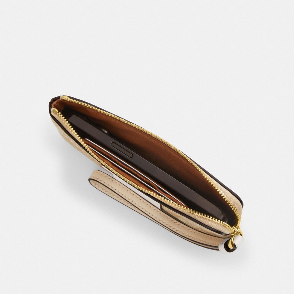 COACH®,Corner Zip Wristlet In Signature Canvas,Canvas,Leather,Pouch,Wristlet,Color Block,Logo,Casual,Multi Color,Inside View, Top View