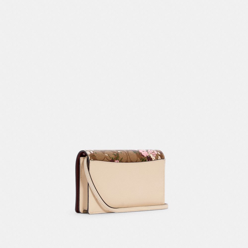 Anna Foldover Crossbody Clutch In Signature Canvas With Evergreen Floral Print