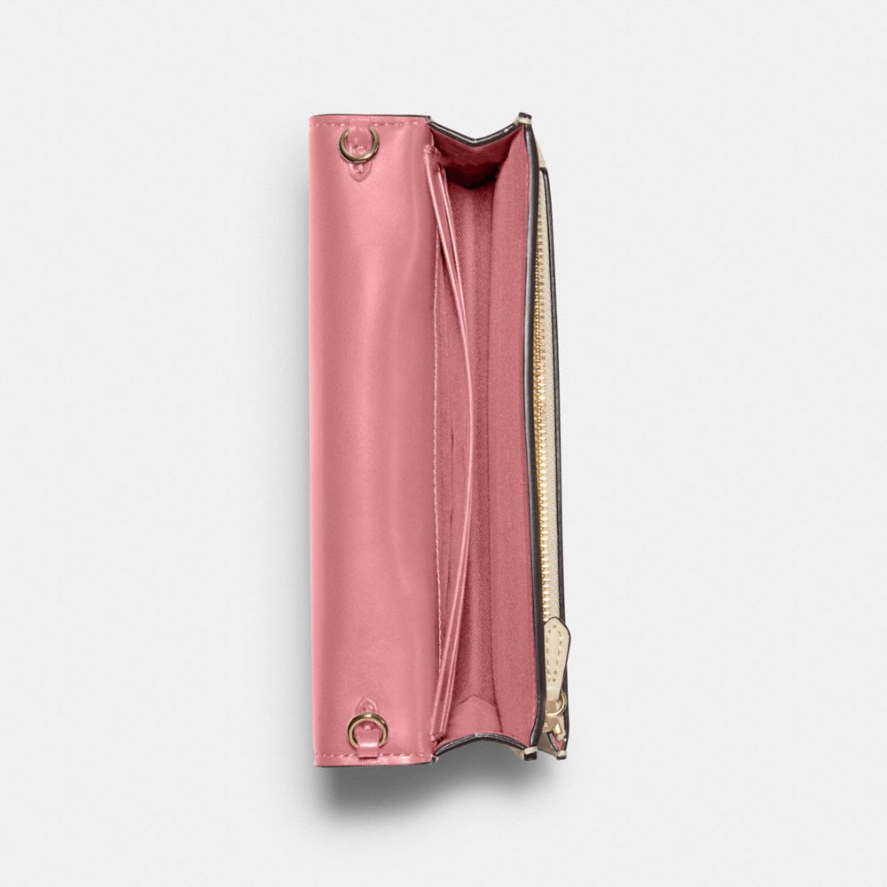 Anna Foldover Crossbody Clutch In Signature Canvas With Evergreen Floral Print