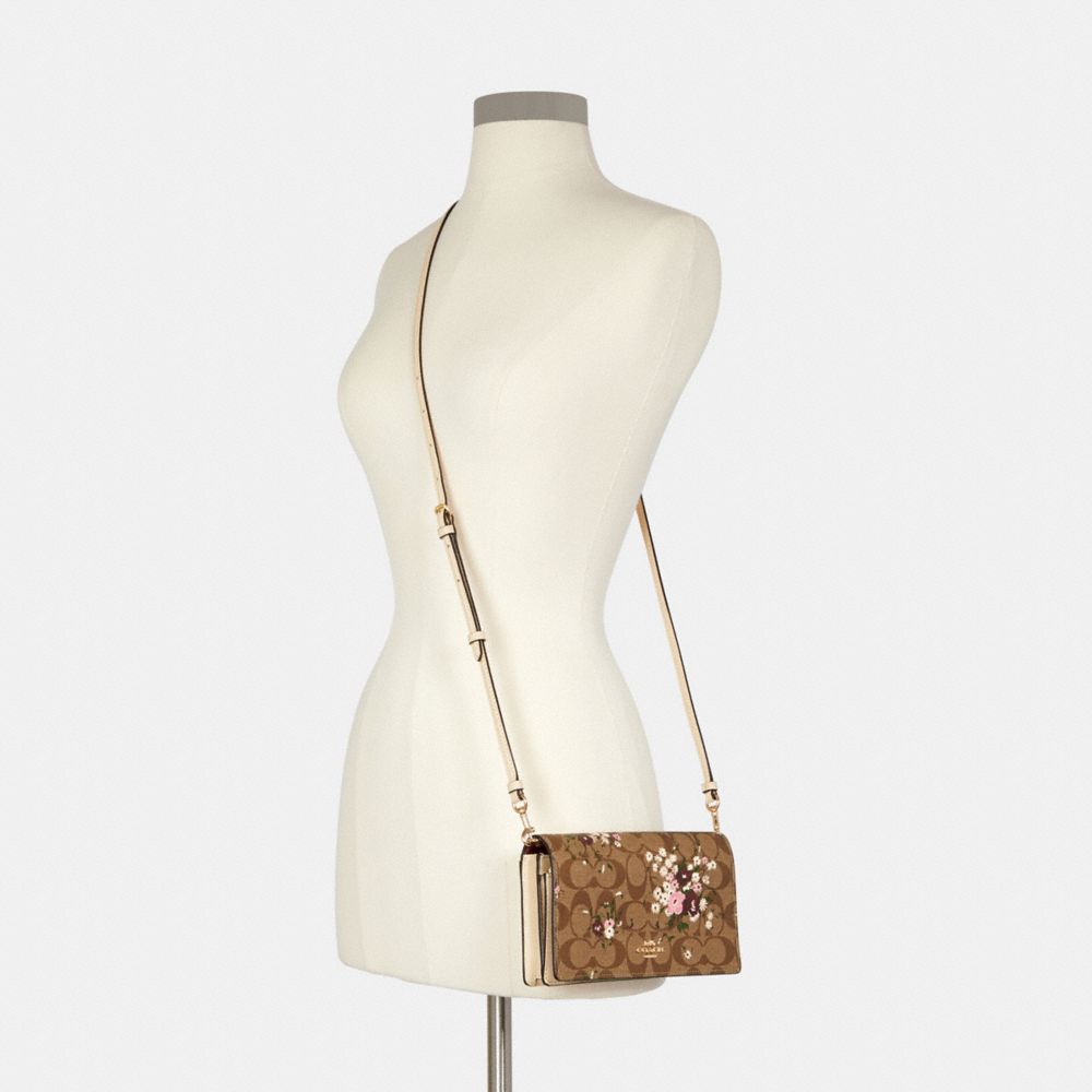Anna Foldover Crossbody Clutch In Signature Canvas With Evergreen Floral Print