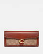 COACH®,TABBY LONG WALLET IN COLORBLOCK SIGNATURE CANVAS,Signature Coated Canvas/Smooth Leather,Brass/Tan/Rust,Front View