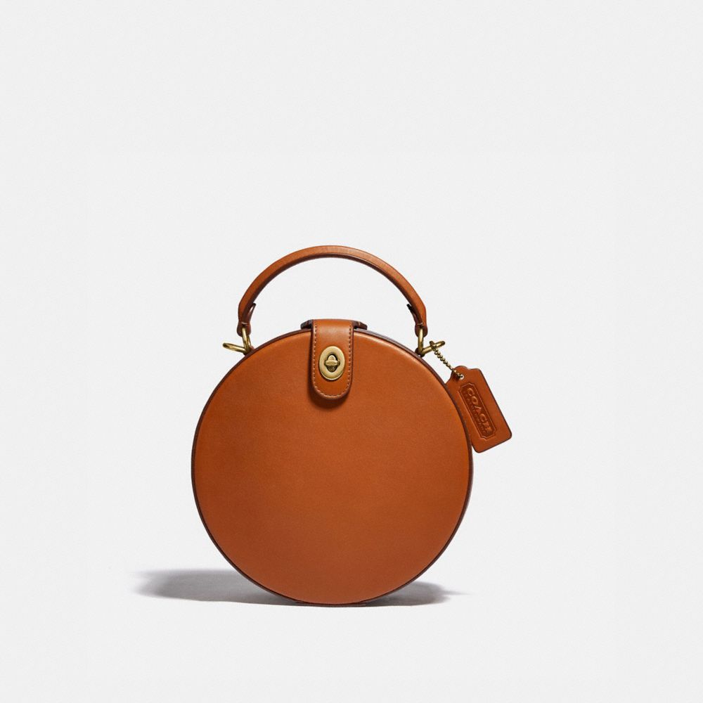 Round coach cheap purse