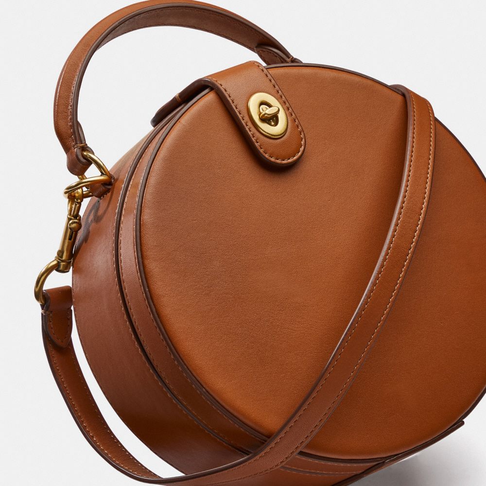 Coach hot sale round purse