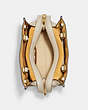 COACH®,COACH X JEAN-MICHEL BASQUIAT ROGUE BAG 25,Leather,Medium,Brass/Ivory,Inside View,Top View