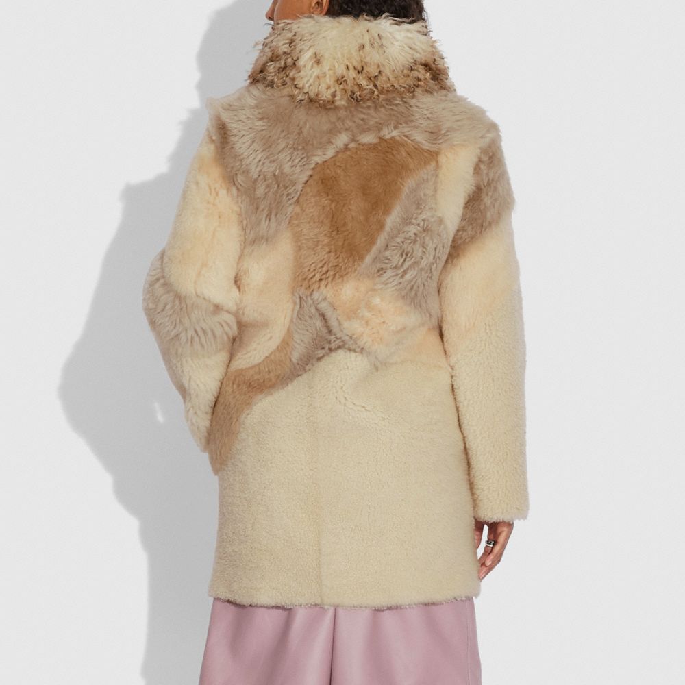 Pieced Shearling Coat