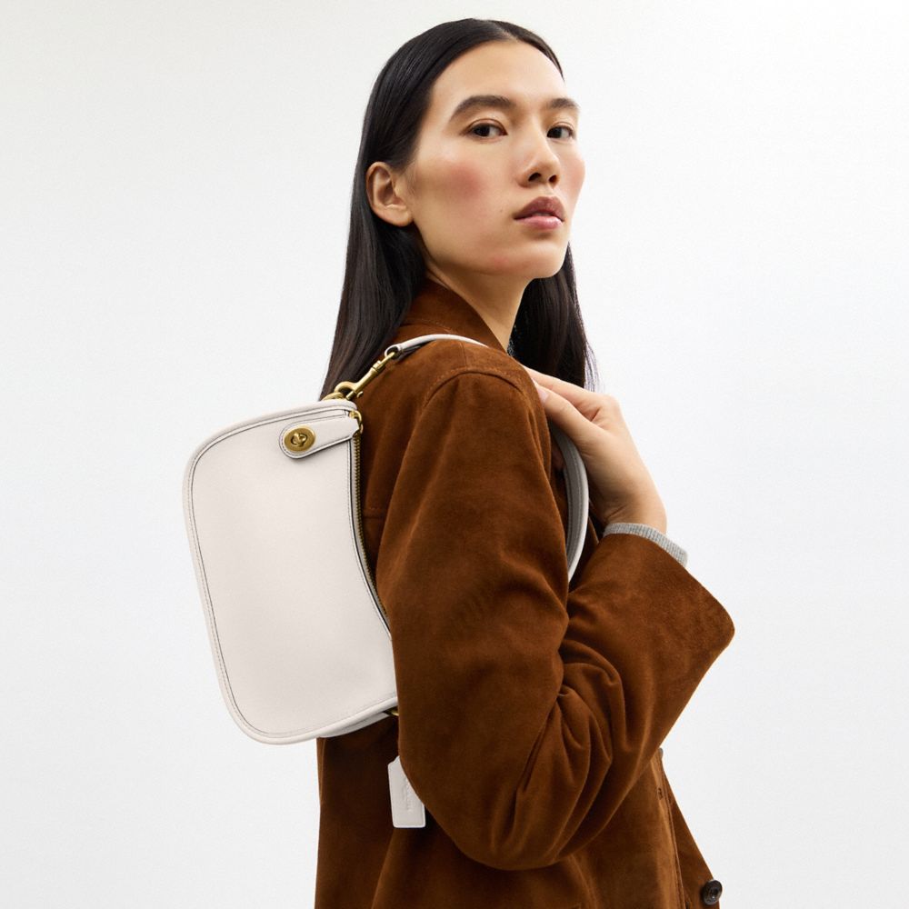 Женские сумки Coach Swinger Bag — фото 8