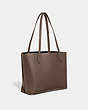 COACH®,WILLOW TOTE BAG,Pebble Leather,Large,Brass/Dark Stone,Angle View