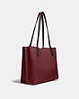 COACH®,WILLOW TOTE BAG IN COLORBLOCK,Pebble Leather,Large,Brass/Black Cherry Multi,Angle View