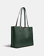 COACH®,WILLOW TOTE BAG IN COLORBLOCK WITH SIGNATURE CANVAS INTERIOR,Pebble Leather,Large,Brass/Amazon Green Multi,Angle View