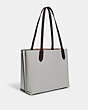 COACH®,WILLOW TOTE BAG IN COLORBLOCK WITH SIGNATURE CANVAS INTERIOR,Pebble Leather,Large,Brass/Dove Grey Multi,Angle View