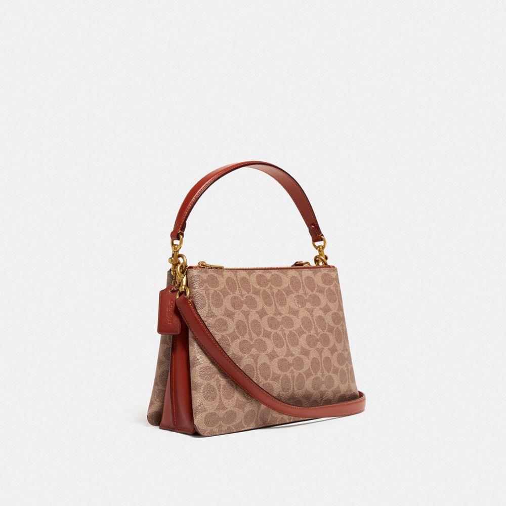 Coach signature zip sale shoulder bag