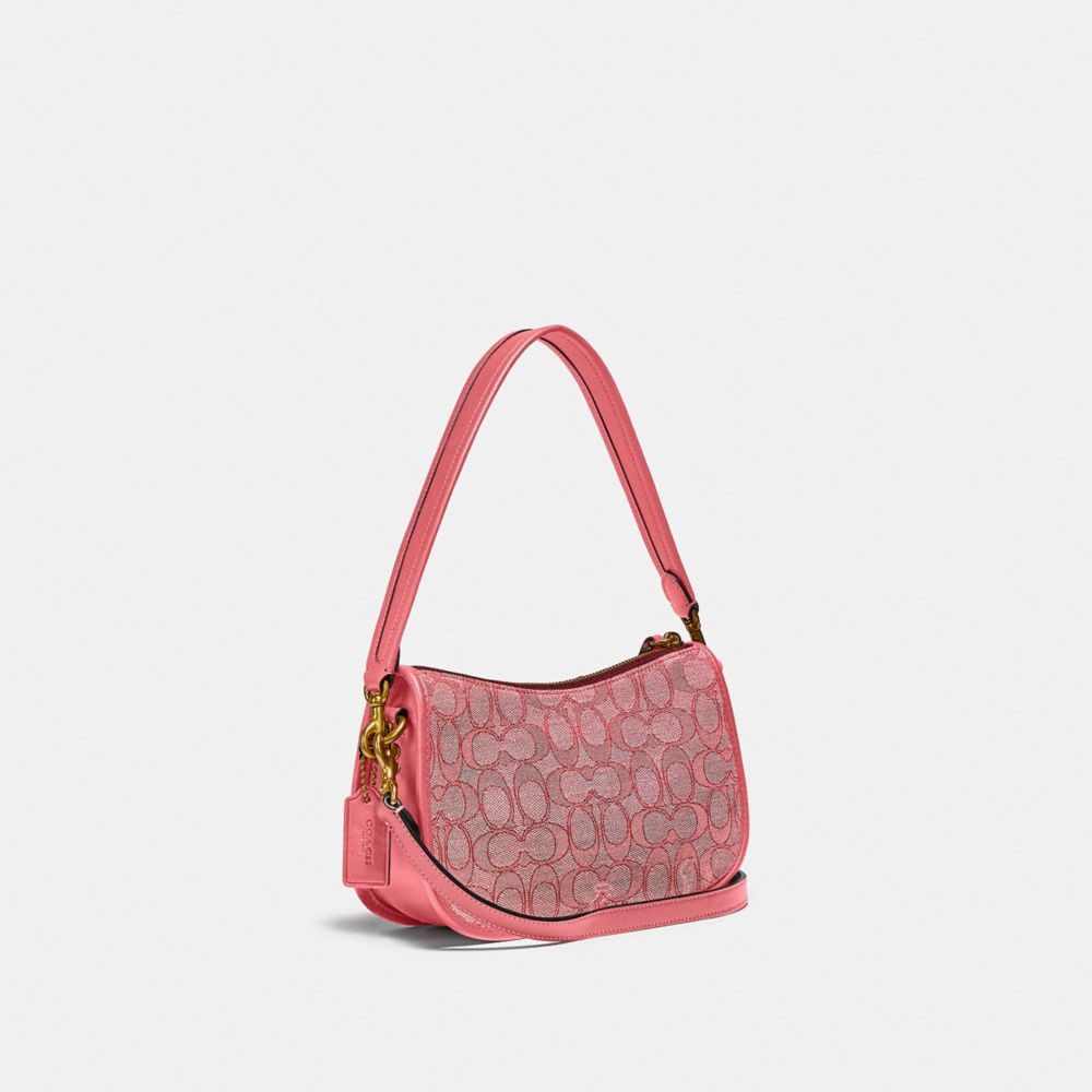 COACH®,Swinger Bag In Signature Jacquard,,Angle View