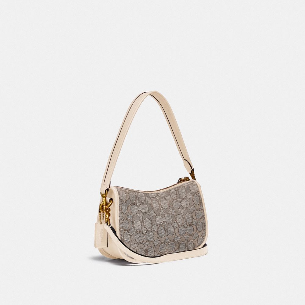 COACH®,SWINGER BAG IN SIGNATURE JACQUARD,Jacquard,Medium,Brass/Stone Ivory,Angle View