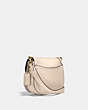 COACH®,BEAT SADDLE BAG,Smooth Leather,Medium,Brass/Ivory,Angle View