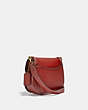 COACH®,BEAT SADDLE BAG,Smooth Leather,Medium,Brass/Red Sand,Angle View