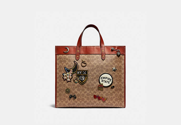 COACH®,FIELD TOTE BAG 40 IN SIGNATURE CANVAS WITH SOUVENIR PATCHES,pvc,X-Large,Brass/Tan Truffle Rust,Front View