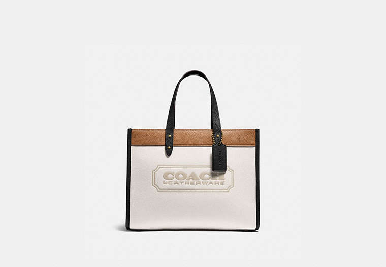 COACH®,FIELD TOTE 30 IN COLORBLOCK WITH COACH BADGE,Pebble Leather,Large,Brass/Chalk Multi,Front View image number 0
