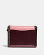 COACH®,COACH X JENNIFER LOPEZ HUTTON SHOULDER BAG IN COLORBLOCK WITH SNAKESKIN DETAIL,Smooth Leather/Exotic,Small,Brass/Peony Oxblood Multi,Back View