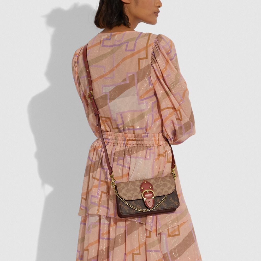 COACH®,Beat Crossbody Clutch In Signature Canvas With Horse And Carriage Print,,Detail View