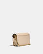 COACH®,ASTER CROSSBODY IN COLORBLOCK,Smooth Leather,Mini,Brass/Ivory Taupe Multi,Angle View