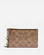 COACH®,ZIP CHAIN CARD CASE IN SIGNATURE CANVAS,Signature Coated Canvas,Brass/Tan/Rust,Front View
