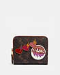 COACH®,BILLFOLD WALLET WITH HORSE AND CARRIAGE PRINT AND SOUVENIR PATCHES,pvc,Brass/Tan Truffle,Front View