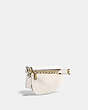 COACH®,CHAIN BELT BAG WITH QUILTING,Pebble Leather/Smooth Leather,Small,Brass/Chalk,Angle View