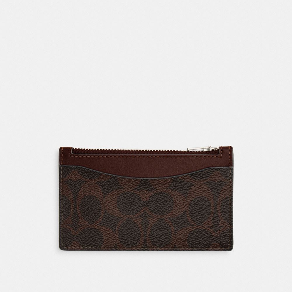 Coach Zip Card Case In Signature Canvas In Brown