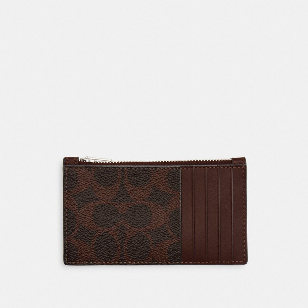 Coach Zip Card Case In Signature Canvas In Brown