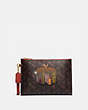 COACH®,CHARLIE POUCH IN SIGNATURE CANVAS WITH BIG APPLE SKYLINE,pvc,Brass/Tan Truffle Multi,Front View