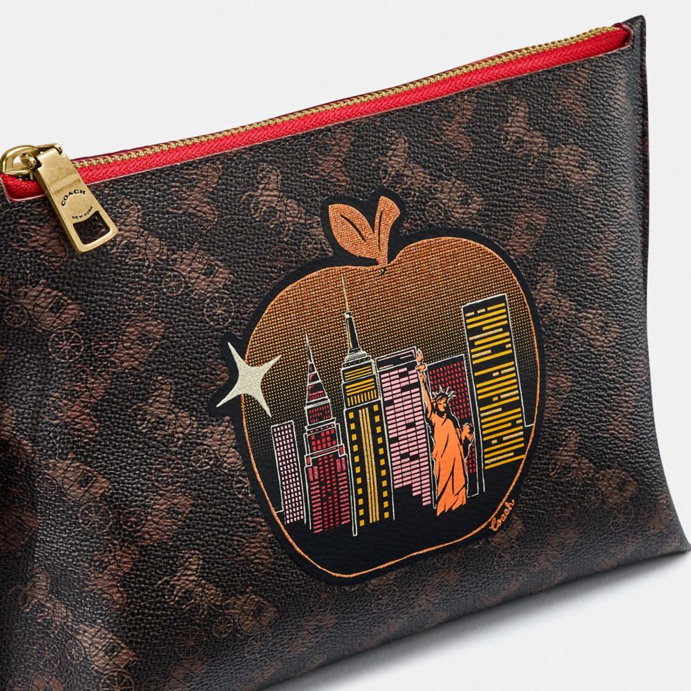 COACH®,CHARLIE POUCH IN SIGNATURE CANVAS WITH BIG APPLE SKYLINE,pvc,Brass/Tan Truffle Multi,Closer View