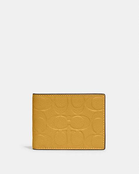 COACH®,SLIM BILLFOLD WALLET IN SIGNATURE LEATHER,Pebble Leather,Mini,Yellow Gold,Front View