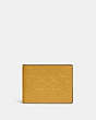 COACH®,SLIM BILLFOLD WALLET IN SIGNATURE LEATHER,Pebble Leather,Mini,Yellow Gold,Front View