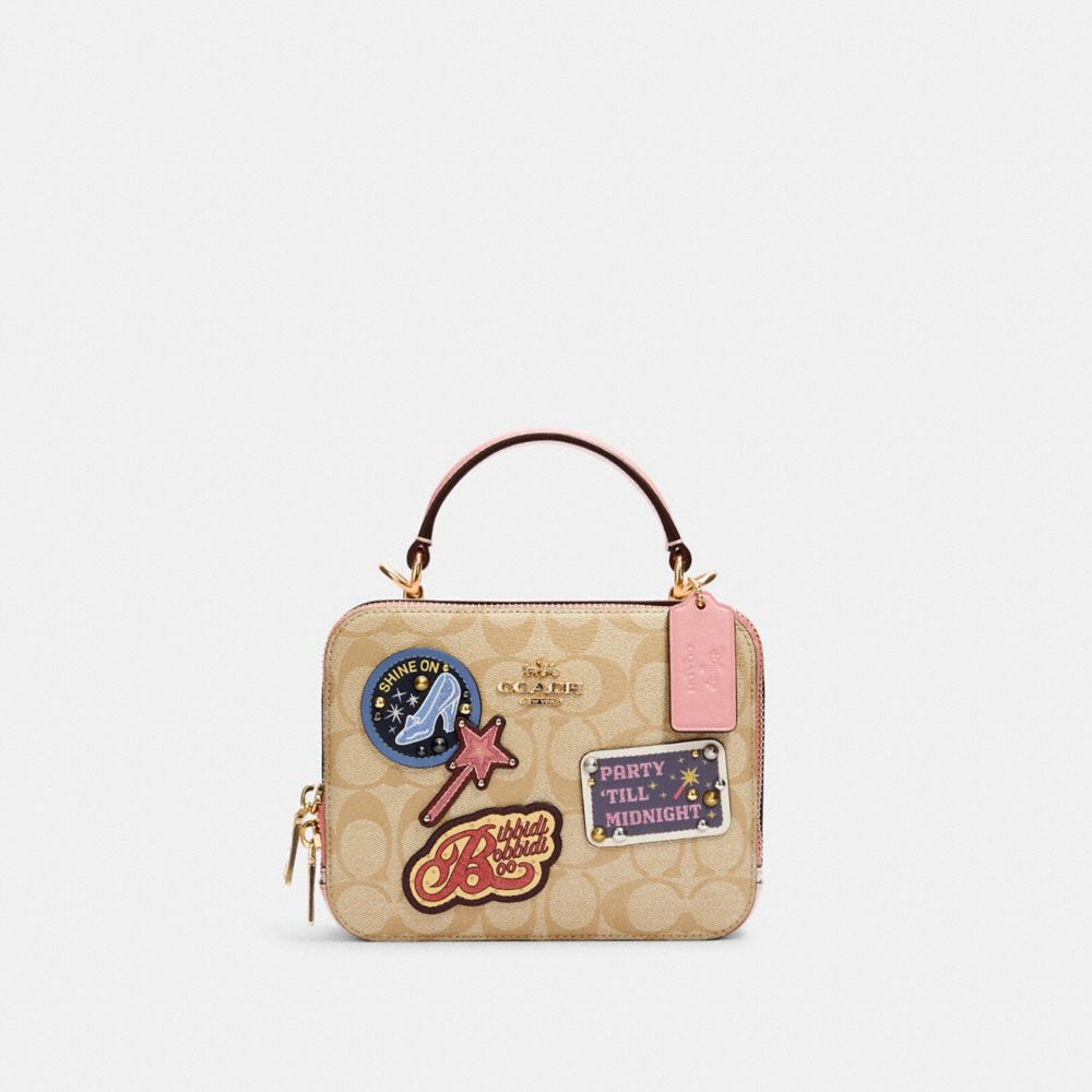 COACH®  Disney X Coach Large Pouch In Signature Canvas With Patches