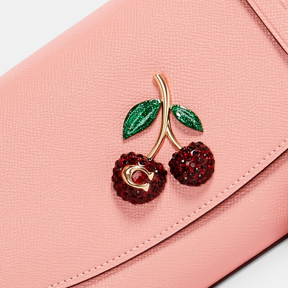 COACH®: Cherry Bag Charm