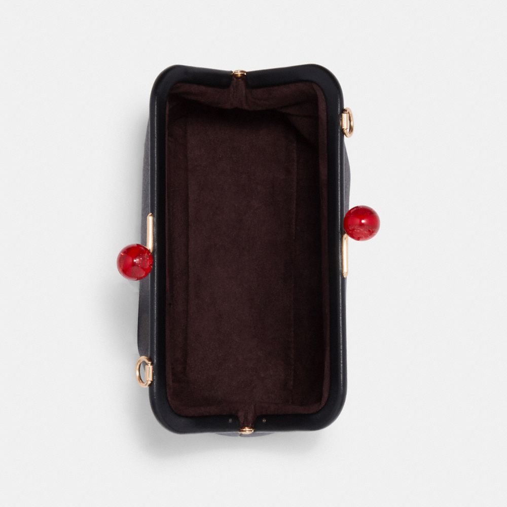 Nora Kisslock Crossbody In Signature Canvas