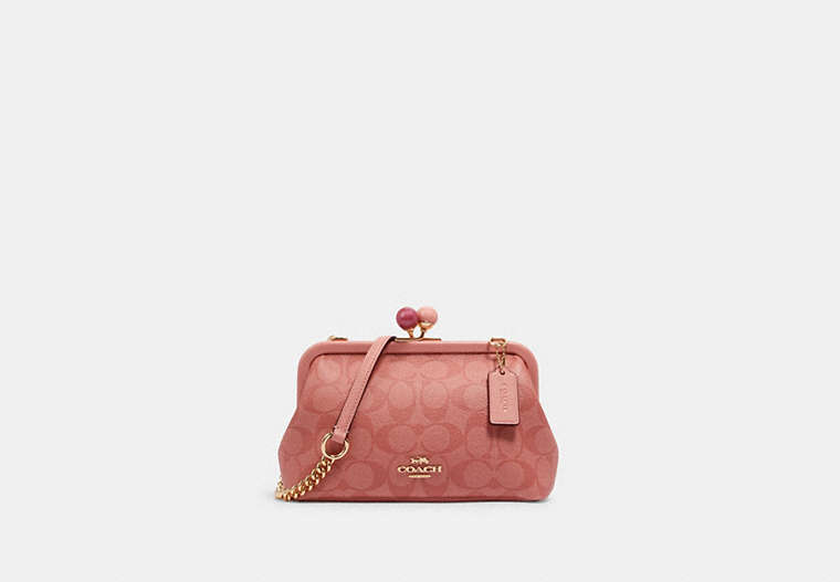 COACH®,NORA KISSLOCK CROSSBODY IN SIGNATURE CANVAS,vachetta,Small,Gold/Candy Pink,Front View