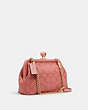 COACH®,NORA KISSLOCK CROSSBODY IN SIGNATURE CANVAS,vachetta,Small,Gold/Candy Pink,Angle View