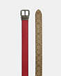 COACH®,ROLLER BUCKLE CUT-TO-SIZE REVERSIBLE BELT, 38MM,Leather,Black Antique Nickel/1941 Red/Khaki,Angle View