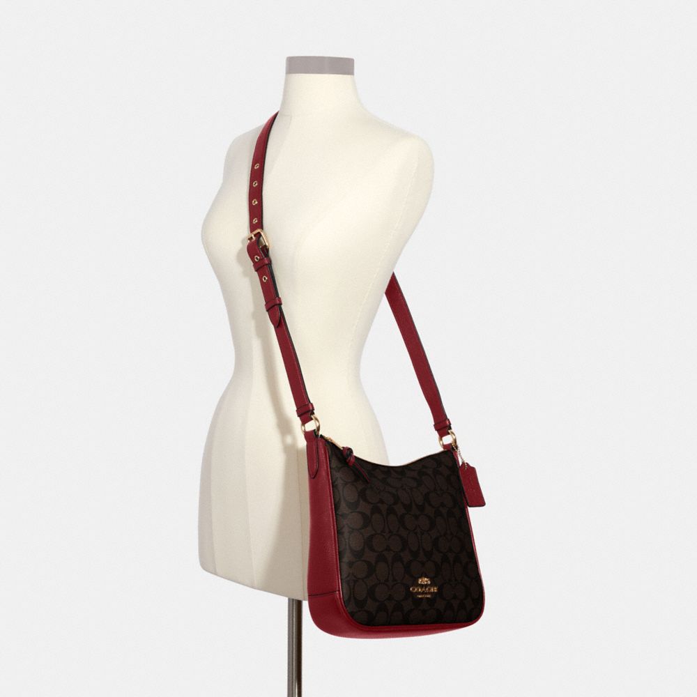 COACH®,Ellie File Bag In Signature Canvas,Canvas,Leather,Crossbody,PVC,Color Block,Logo,Gold Metal,Casual,Brown,Alternate View