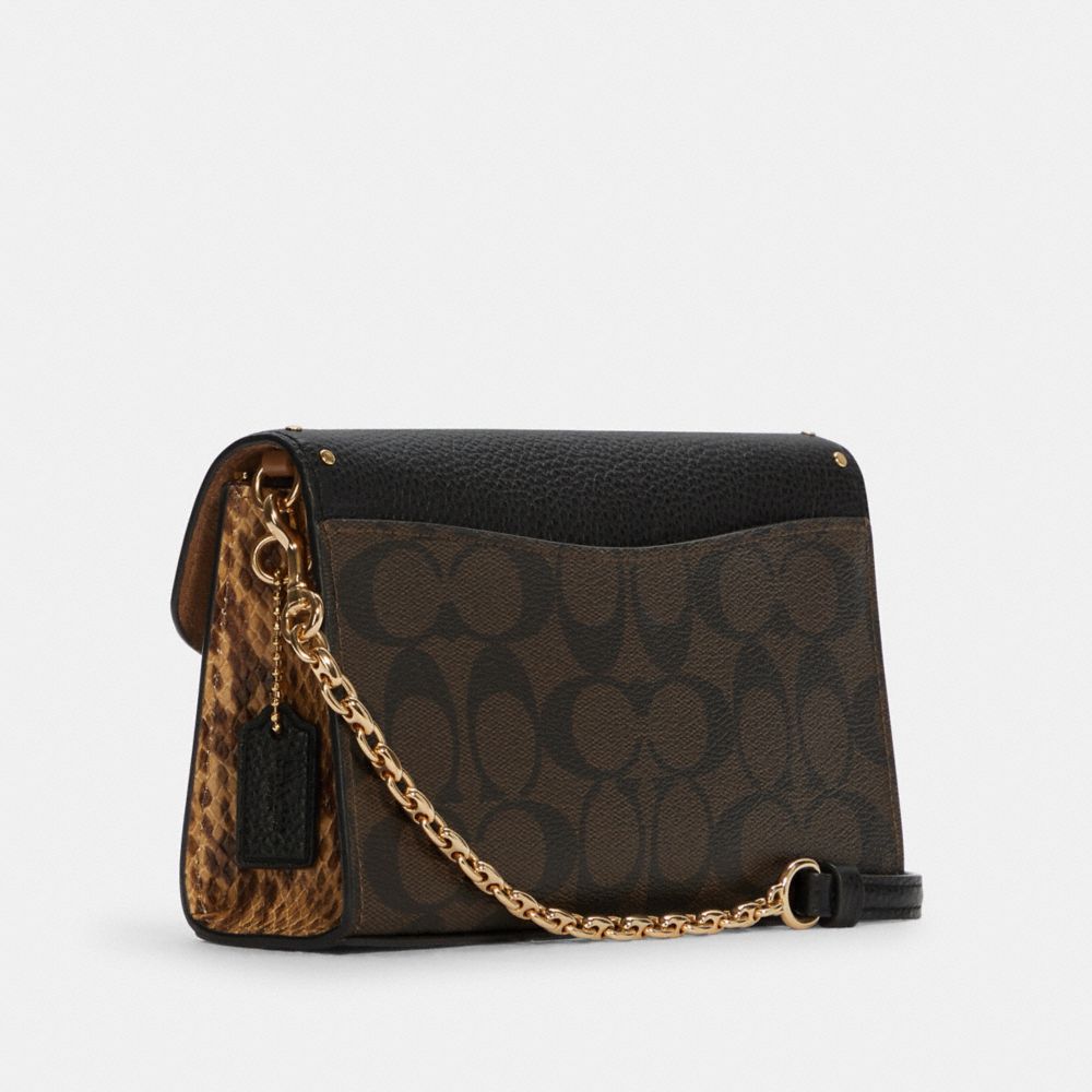 Lane Crossbody In Signature Canvas With Rivets