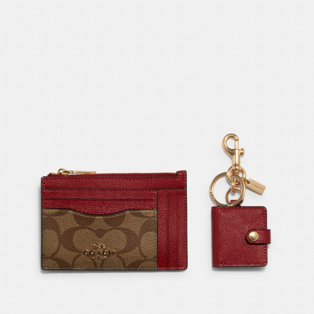 COACH®  Sunglass Case Bag Charm In Signature Canvas