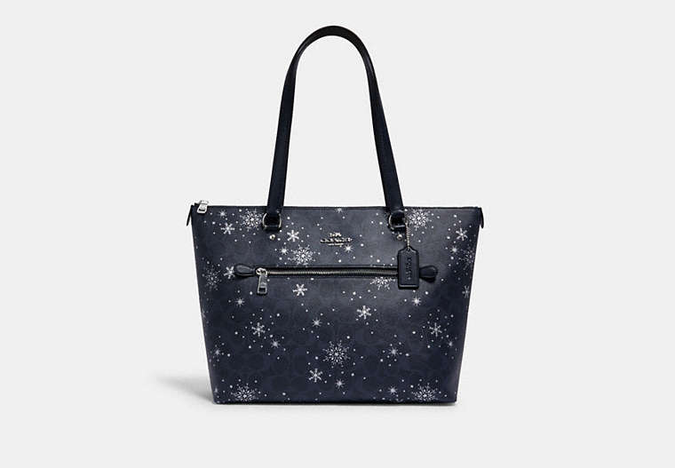 COACH®,GALLERY TOTE IN SIGNATURE CANVAS WITH SNOWFLAKE PRINT,Medium,Silver/Midnight Multi,Front View