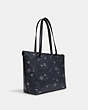 COACH®,GALLERY TOTE IN SIGNATURE CANVAS WITH SNOWFLAKE PRINT,Medium,Silver/Midnight Multi,Angle View