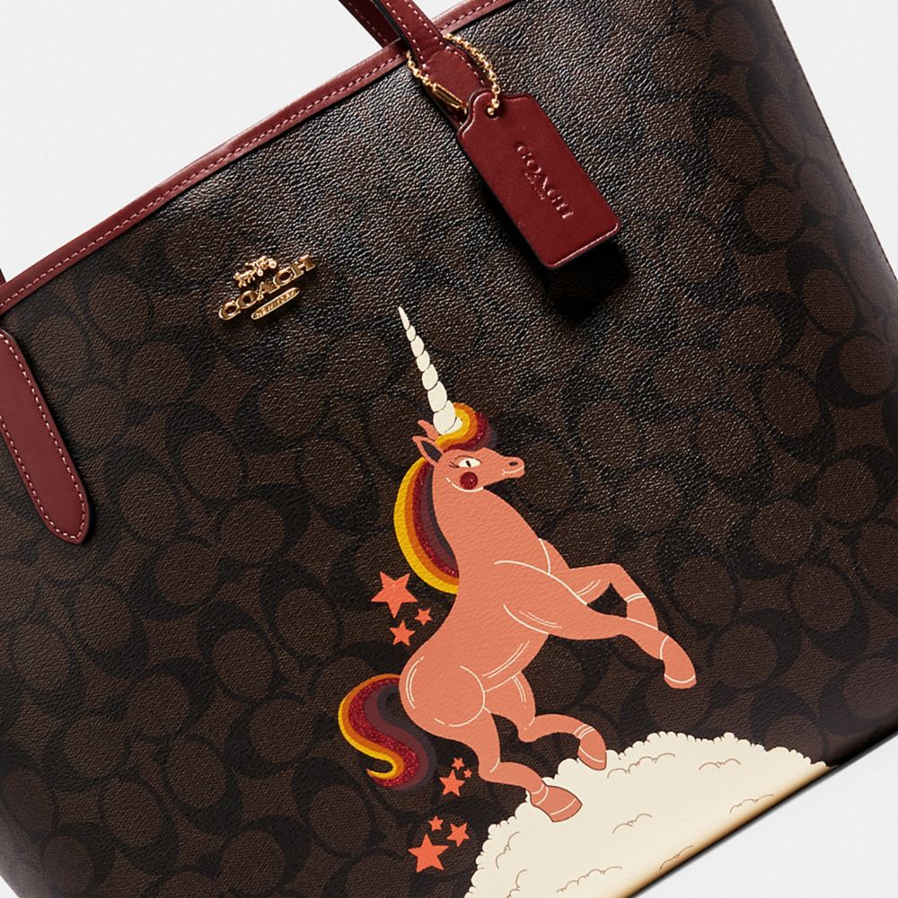 Coach unicorn coin on sale purse