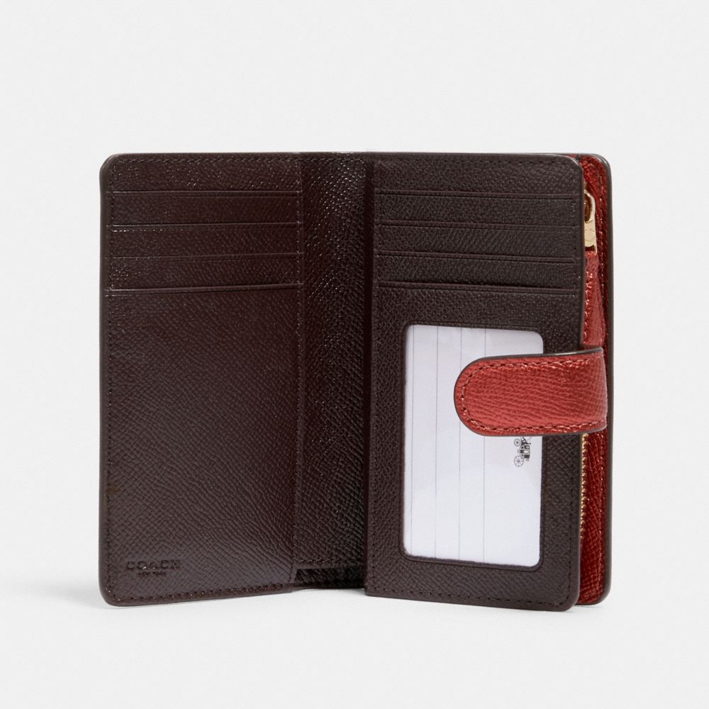 COACH®  Medium Corner Zip Wallet With Signature Leather