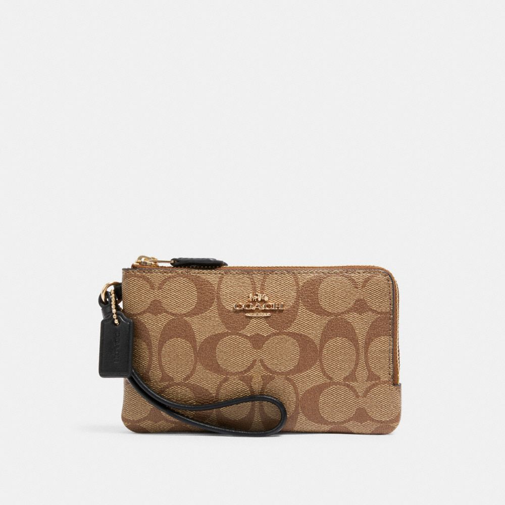 Coach Outlet Corner Zip Wristlet In Signature Canvas