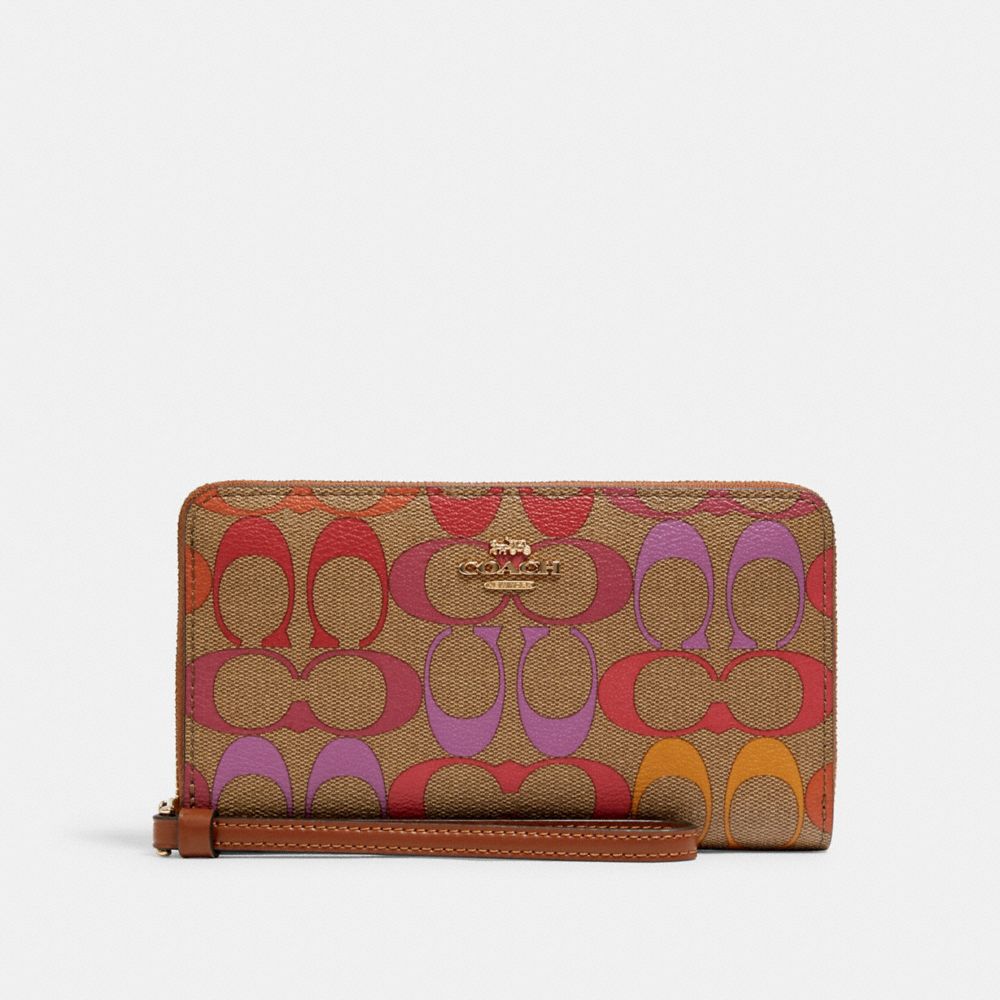 COACH Outlet Large Phone Wallet In Rainbow Signature Canvas